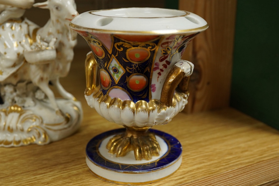 A pair of Bloor Derby white and gilt porcelain figures, Tailor and his Wife, together with a pair of small Imari pattern campaign spill vases, largest 14cm high. Condition - some restoration